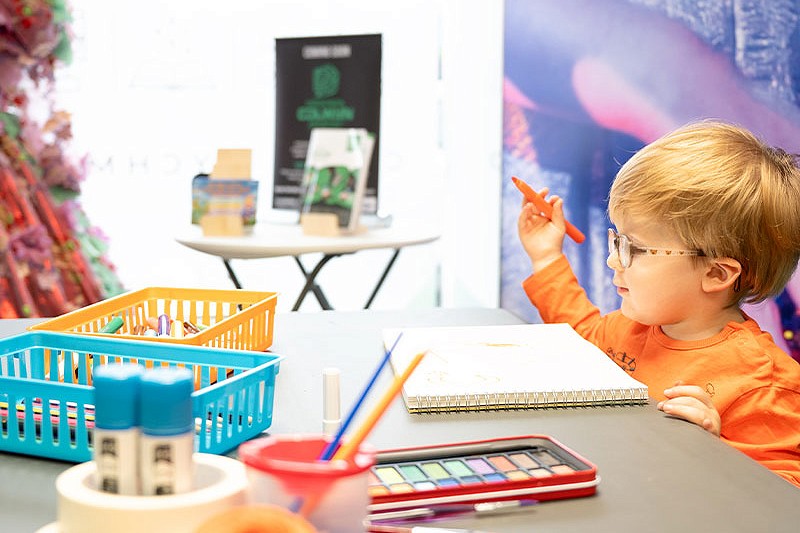 boy taking part in craft session at Creadigol Colwyn Creative